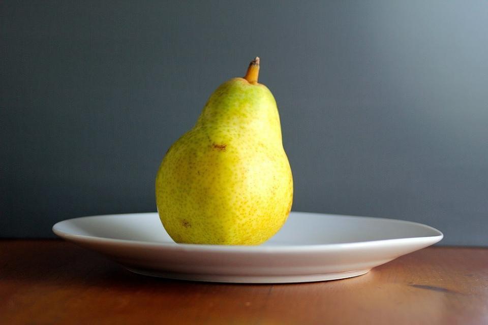 16. Pears
Like apples, pears are high in the fiber pectin, which has been shown to help suppress appetite. Grab a pear (skin on) when you're feeling peckish to curb your cravings for vending machine fare.