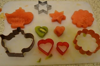 Use many different shapes and sizes and attach each piece to skewers to hold in place. 