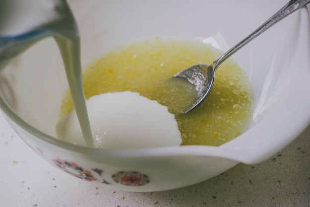 Stir together lemon juice and zest, then add buttermilk.
