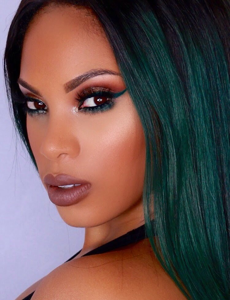 @msroshposh on YouTube!

She's a perfect makeup beauty guru for women of color! She does celebrity inspired looks, and everything from dark vampy looks do fun looks with pops of color!