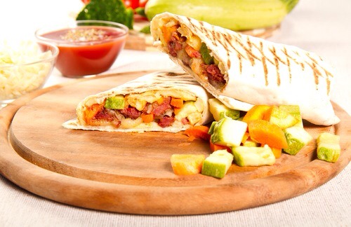 4. Balsamic zucchini tomato sandwich wrap
Taste this vegetarian wrap with its fiber, phytonutrients and a plenty of nutrients. You can eat this sandwich warm or cool. Enjoy!