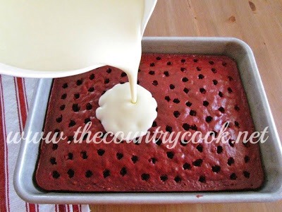 Pour pudding over cake. Taking care to get right into the holes as much as possible.
