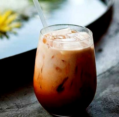 Directions
In a kettle, bring the water to a boil. Place the tea in a teapot or glass container. Pour the water over the tea and let steep until bright orange in color, 3 to 5 minutes. Strain into a clean container, such as a pitcher (or, if in tea bags, remove the bags). Add sugar and stir 