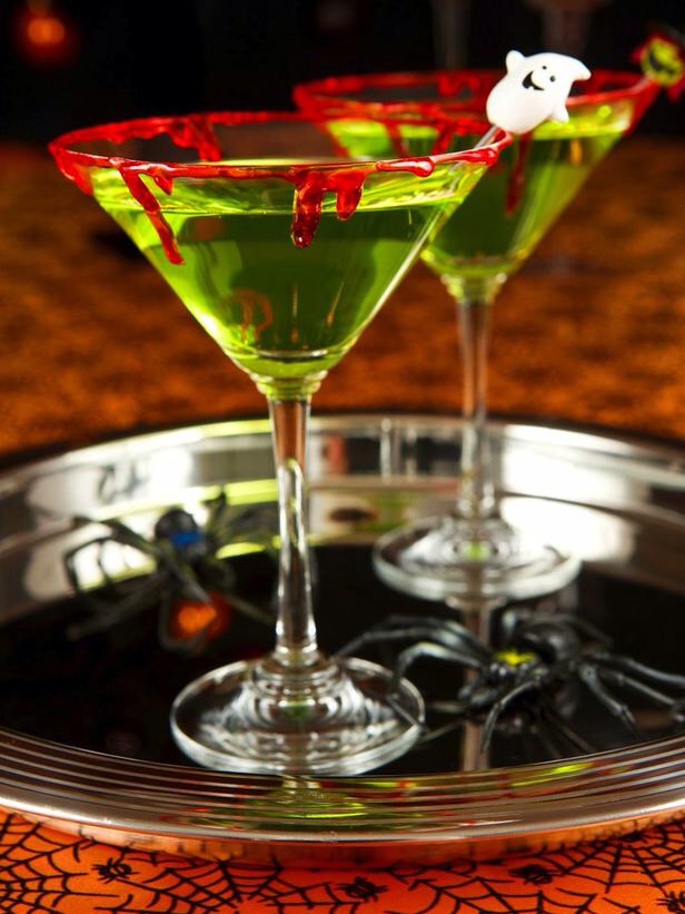 Zombie Slime Shooters

A blend of 4 liquors, this fruity cocktail goes down easy but packs a mighty wallop. Complement the drink's eerie green hue with red 'slime' you can easily make yourself with just corn syrup and red food coloring. 