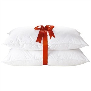 Use 2 pillows to get rid of facial puffiness 