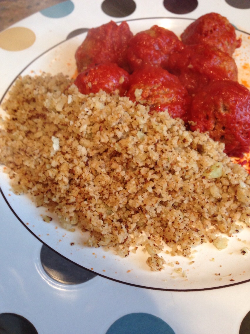 Add spices, 
When browned to your liking, (I like it darker) remove from pan.
Use as a great side dish instead of rice or potato! In this example I paired it with sweet and sour meat balls, however be free to get creative!
You could even roast some veggies/onions and mix it into the cauliflower rice