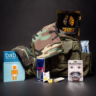 Operation Diaper Dump  –  Your mission: Expose. Depose. Dispose. And then be on your way with your mini-me before any civilians catches even a whiff of the diaper crisis you just averted. With the New Dad Tactical Bag, taking care of baby business is business as usual.