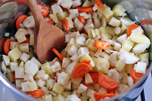 10. Add the vegetables (except the garlic).
11. Add 1/2 teaspoon of salt and cook your vegetable mixture over medium heat for about 10 minutes, stirring occasionally.