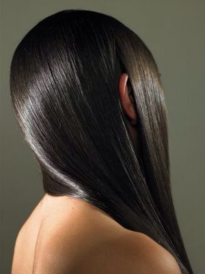 8. To add little shine to your hair:
Smooth a tiny amount of coconut oil onto your ends to add a little shine, or on flyaways if you have dark hair. Remember that a dab will do you: Any more and your hair might appear greasy.