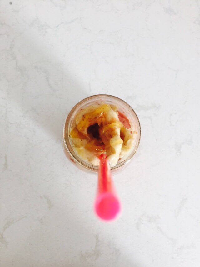 Felt like something cold and refreshing! This is a strawberry smoothie with Banana Nice cream on top and honey!! 