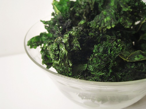 Kale is one of the healthiest vegetables on the planet! Get a bunch of kale from your local grocery store ( I like organic the best). wash kale thoroughly. Then rip the leaves off of the kale and put on a olive oil drizzled cookie sheet. Then drizzle just a bit more oil over your kale and sprinkle a teaspoon or so of sea salt. Bake for 10 minutes until kale is crunchy at 350 degrees.