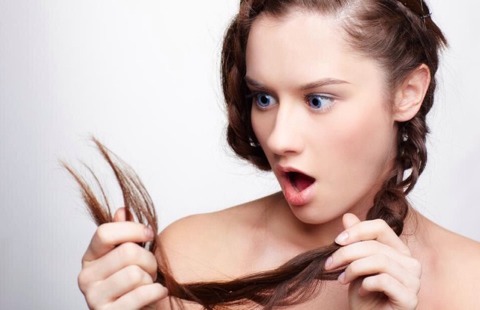 8. Apply a bit of vaseline to the ends of your hair to make them appear healthier