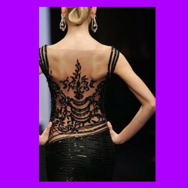 Who says black is bad luck at weddings? This dress is sure to hold everyone's attention throughout the ceremony.