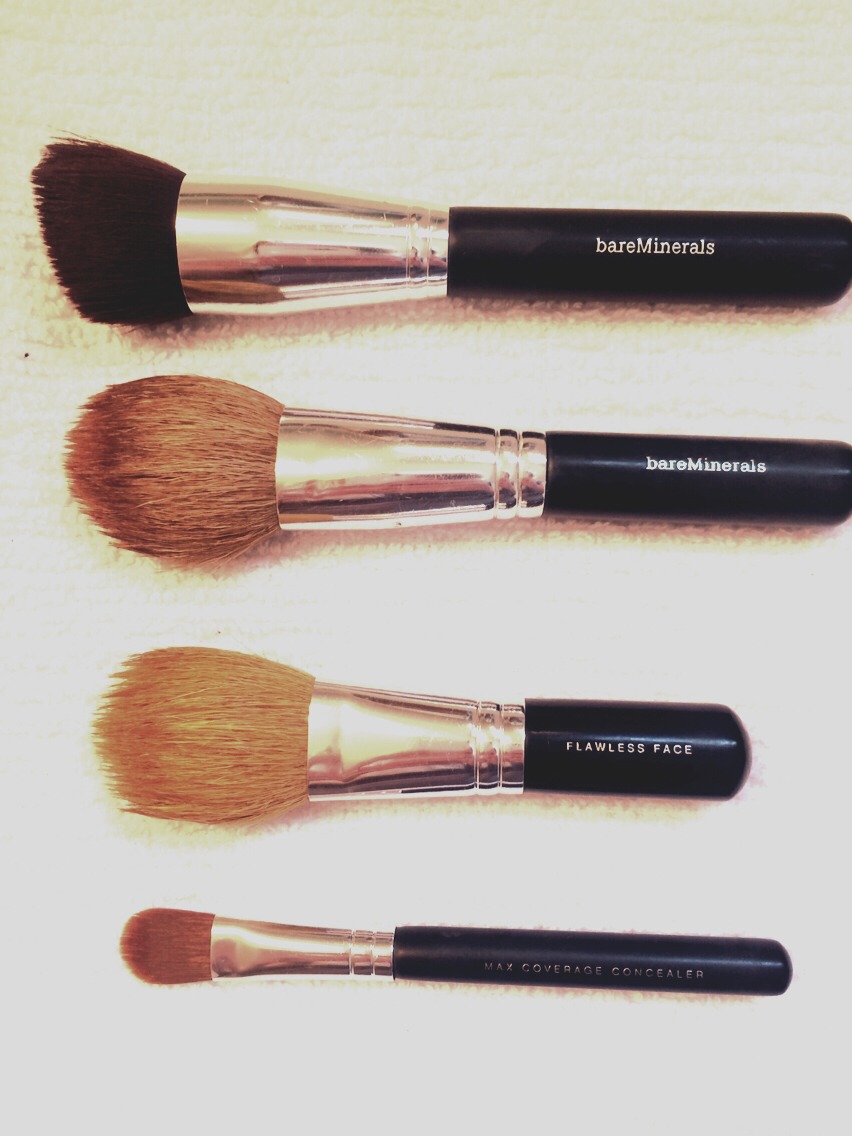 Reshape the bristles and lie them on a towel.
Takes a little while to dry this way but it's much better on the brushes this way as opposed to towel drying them completely . 