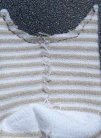 It's sewn together here. 