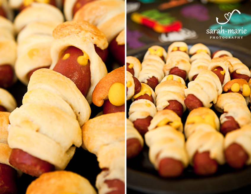 Wrap a crescent roll around some mini hotdogs like a mummy and cook them for a fun treat.