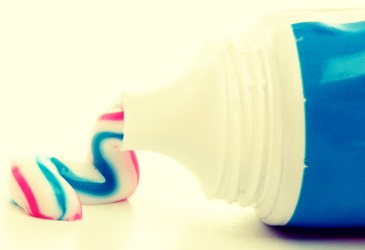 Toothpaste is a great way to dry up spots and shrink overnight . Just apply a dab to the area were your spots are and leave it overnight and you will wake up with SPOT FREE skin. DO NOT USE GEL TOOTHPASTE .