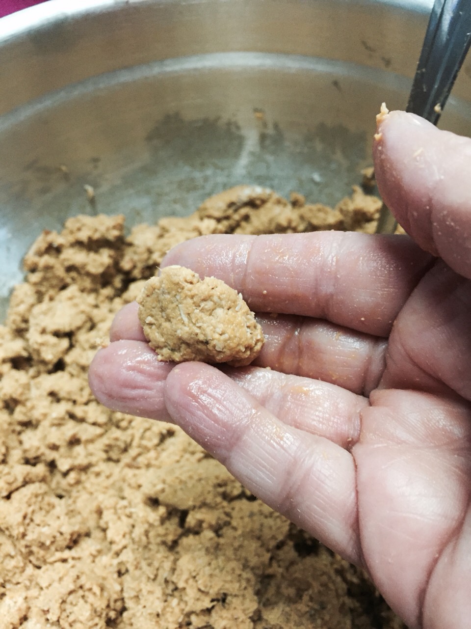 Make sure you can roll your meat and it sticks together. 

This is the perfect consistency.  There should be enough sauce in the meat to flavor it but not too much to make it not sticky in consistency. 