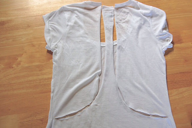 1. Start by lightly drawing a rounded upside down T shape on the shirt and cut along the lines.