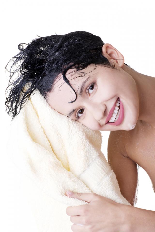 Towel Dry The Right Way
Don't rub your hair dry with your towel; it will cause your hair to frizz. Instead, before getting out of the shower gently squeeze excess water from your hair. Then, wrap your hair in a towel and pat it dry to absorb any remaining moisture.