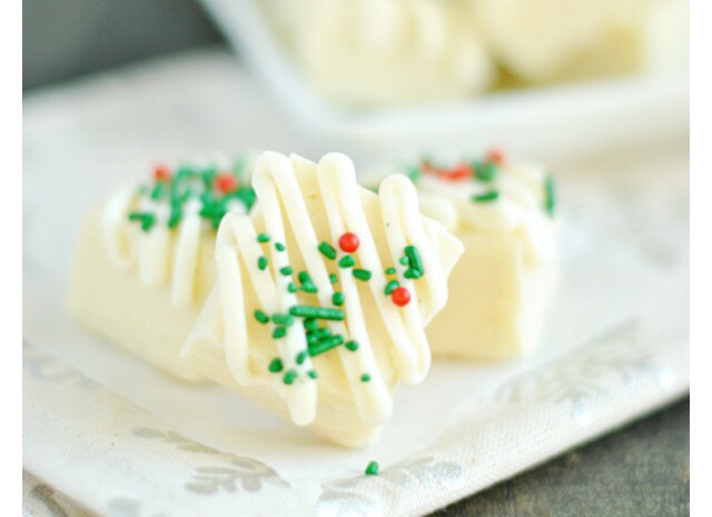 Step one: Line inside of the baking dish with parchment paper.
Step two: Over low heat, mix together the condensed milk, vanilla bean paste, and white chocolate until smooth and melted. NEVER INCREASE HEAT! Just keep stirring.
Step three: Once smooth, pour mixture into baking dish.