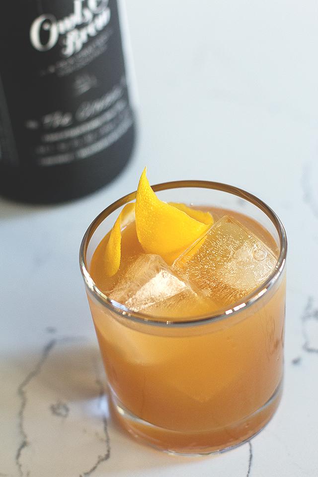 California Iced Tea

1.5 oz gin
3 oz Owl's Brew The Classic Tea
1 tbsp lemon juice
Pinch of lemon zest

Pour all ingredients over the rocks. Stir and serve.