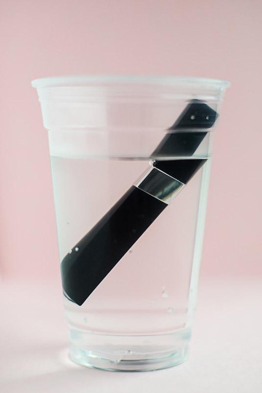 7. Soak your mascara tube in a cup of hot water to make the formula liquid-y instead of clumpy. This will make the formula thinner and easier to apply.