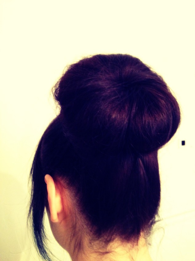 2. A simple bun! Now to get a nicer look, just tug on the bun a bit to give it that messy look!