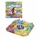 Trouble - this is a fun little game for kids and adults that has simple rules and strategy. I think of it, and Sorry as basically the same game, in different forms (with Sorry being slightly more complicated). We have both in our house, but you can easily get by with one or the other.