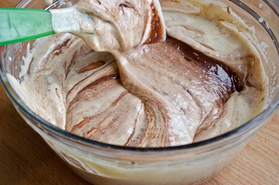 Now fold in the melted chocolate and whipped topping until combined. Add in the mini chocolate chips