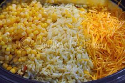 When it is done cooking, drain your corn and toss that in along with your cooked rice and cheddar.

