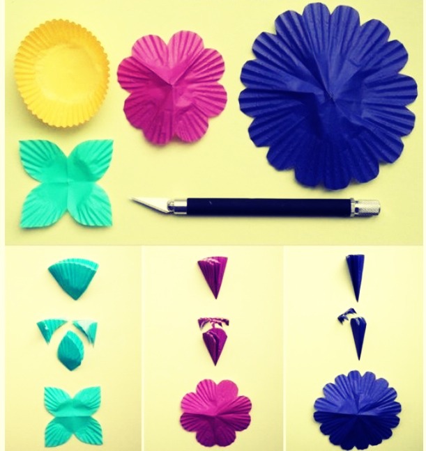 From the little cupcake papers, cut like the teal and purple ones so that they create the inside petals of the flower and the leaves in the back. 