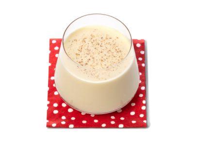 Transfer the eggnog to a pitcher, cover and refrigerate until cold, at least 3 hours and up to 1 day. Pour 1 to 2 tablespoons bourbon into each glass. Top with the eggnog and sprinkle with nutmeg.
