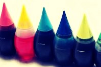 Add a different color of the rainbow to each of the cups. 