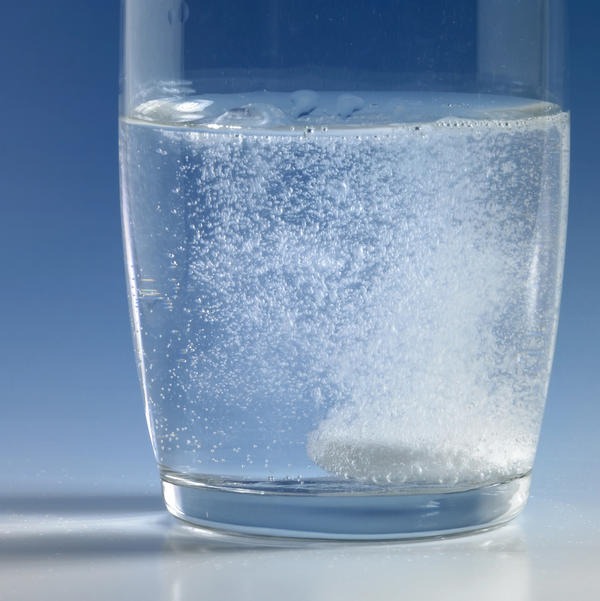 Gargle salt water. 
A slightly less delicious way to relieve a sore throat: Gargle a mixture of warm water and salt.