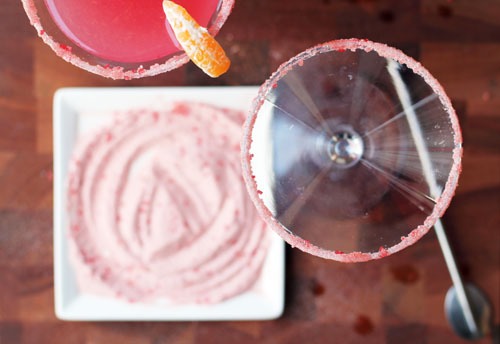 In a shaker filled with ice, mix cranberry juice, cutie juice and lime juice. Add lemon-lime soda and stir. Strain into two martini glasses with edges that have been dipped in cranberry sugar (sugar optional). Garnish with a cutie slice.