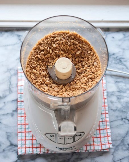 Pulse them a few time until chopped. If you want chunky peanut butter remove 1/2 cut of the peanuts and set them to the side.