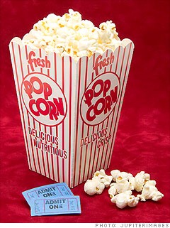 7. Avoid Buttered Movie Popcorn
The large popcorn at the concession stand contains a whopping 1,005 calories.
Sneak in your own microwaveable popcorn and save more than 700 calories.