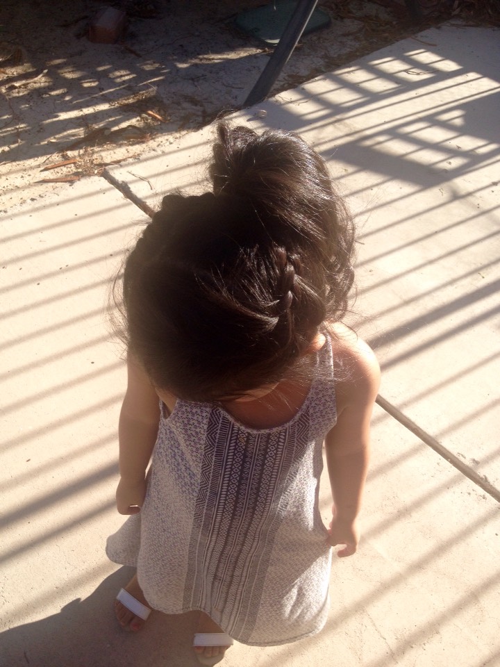 Both sides are brainded and then tied up into a ponytail