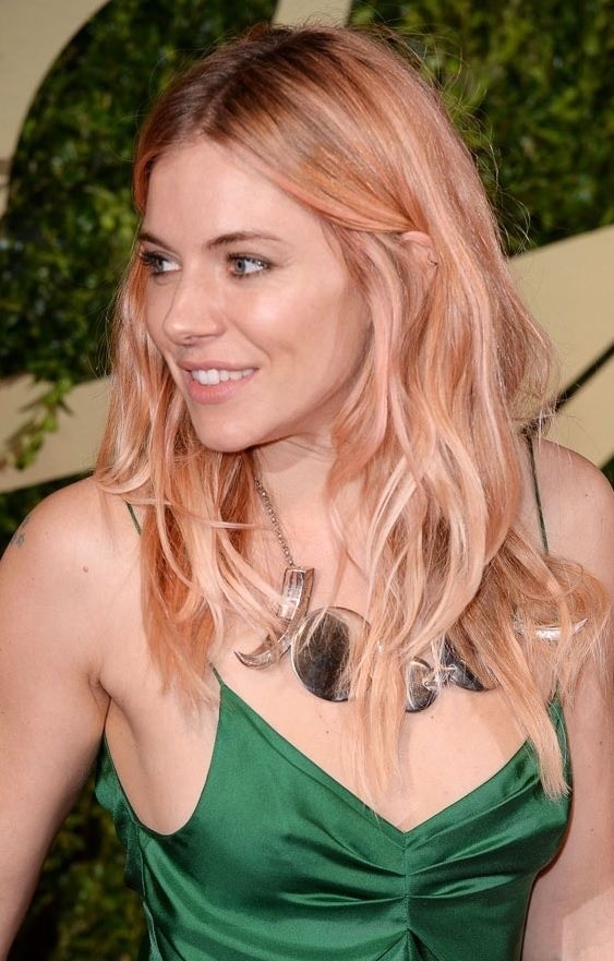 Rose gold became popular in 2013 and I don’t see it losing its appeal in 2014. This mix between blonde, brown, pink, and gold is soft with subtle drama. Rose gold is the perfect color to sport in the spring and summer of 2014