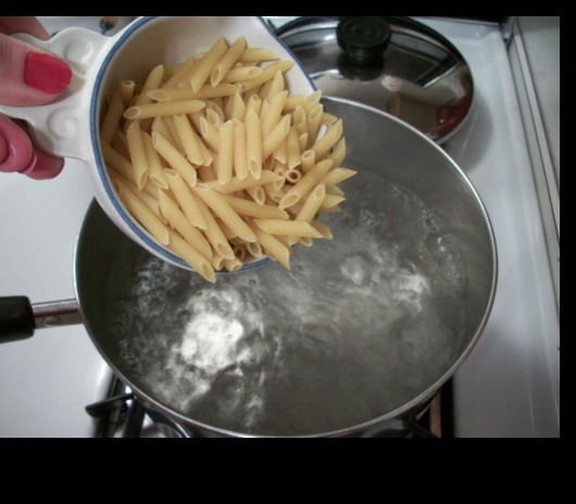 Boil some pasta and stir every few minutes so that the pasta doesn't stick together. 