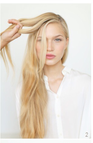 2) Begin a regular French braid at the top, near the part.

