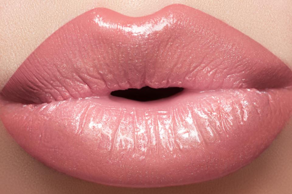 Create Fuller Lips
If you're tired of having thin, pursed puckers, extend your lip line using a neutral-toned lip liner. Then apply lipstick over top. Be careful though — don't extend your lip line too much.