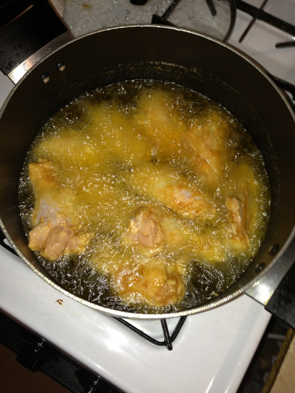 Them fry them for about 15 to 17 minutes. 
Heat up oil place the chicken in when the chicken is in low heat a little bit only  