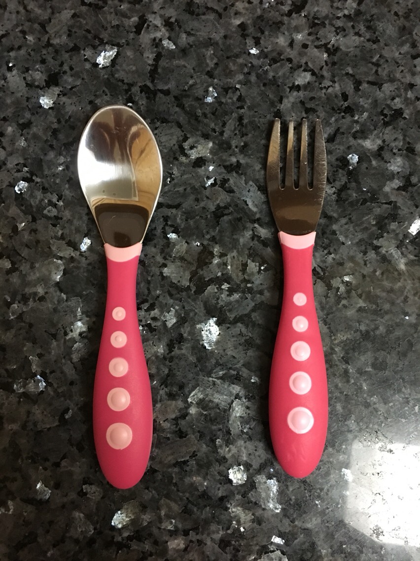 My toddler seems to control these easy grip utensils made by Gerber better than any other.
I got this set on Anazon.
The more sets you buy the cheaper it is!!!!!