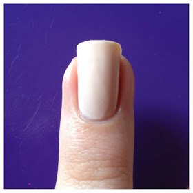 Step 1: You'll need to apply a white or nude color on every nail as your base, this will help the next set of colors pop. Wait for this to dry completely. This is OPI- Sweet Heart (it was not shown in the picture above.)
