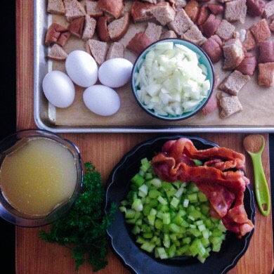 You will need:
2 Tablespoons vegetable oil
3 stalks celery,chopped fine
2 medium onions,chopped fine
4 slices cooked bacon,crumbled
2 teaspoons garlic powder
salt and pepper to taste
2 cups turkey (or chicken) stock
4 eggs
1 cup parsley,minced
2 large loaves whole wheat bread