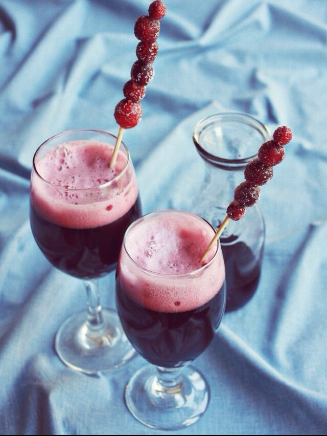 For the cranberry garnish simply skewer cranberries onto a small wooden stick (mine are kabob sticks). Rinse with water and generously sprinkle with sugar. Then freeze for an hour or overnight so the sugar adheres to the cranberries.