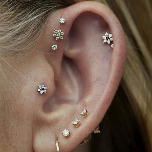 Piercings or earings