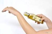 warm up olive oil, and apply onto skin & face, massage thoroughly, best to do this before bed or after a shower. 

Try & apply olive oil on 3-4 times a week. 
You can use baby oil or coconut oil instead of olive oil but I found olive oil works best.
